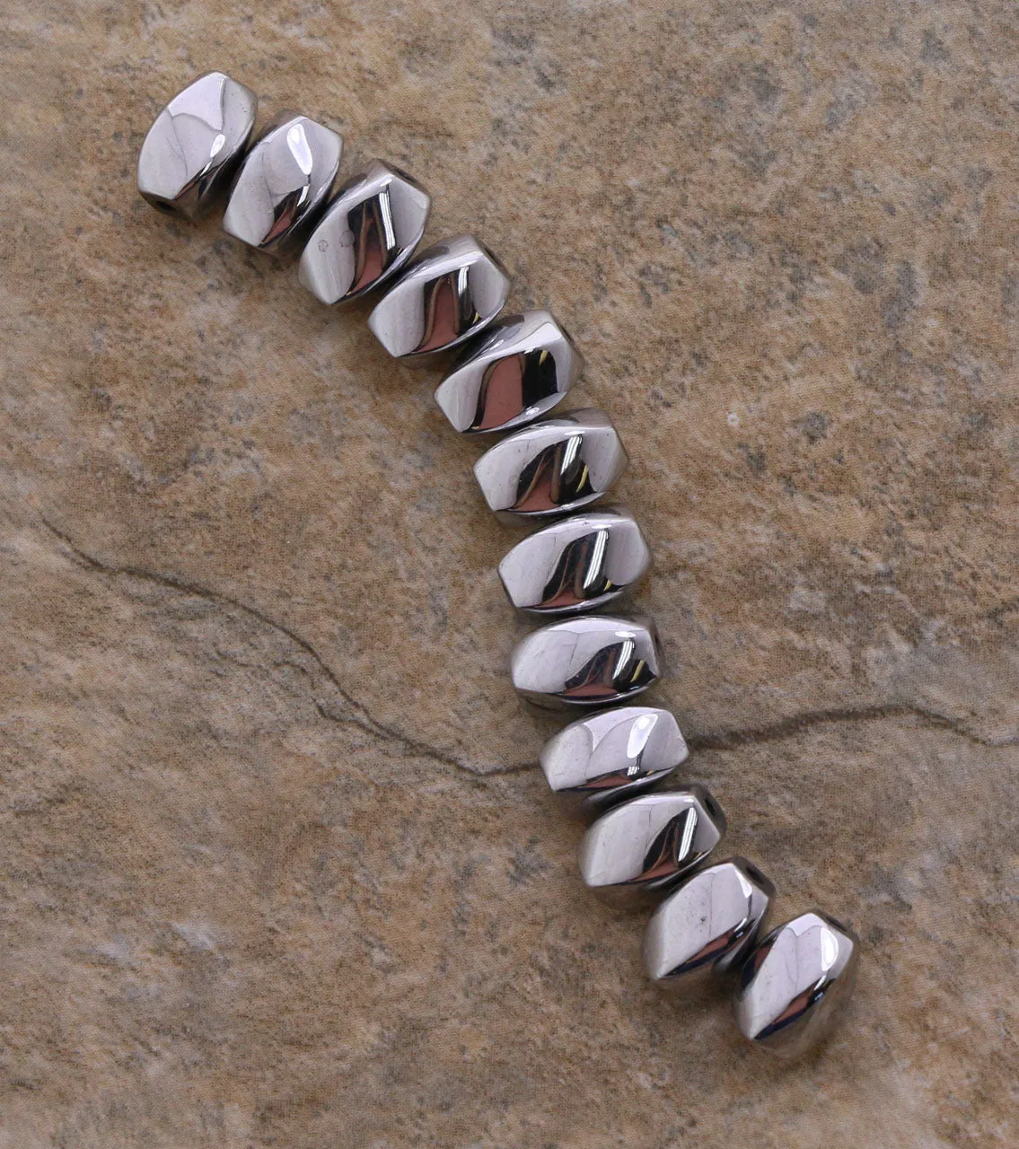 5X8mm Magnetic Hematite Silverplated Twist Mh74