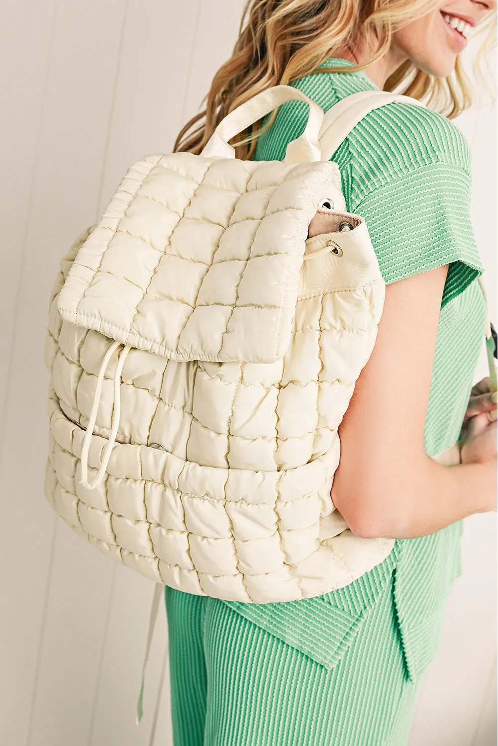 Black Solid Flapped Quilted Puffer Backpack