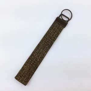 Gold and Black Key Fob.