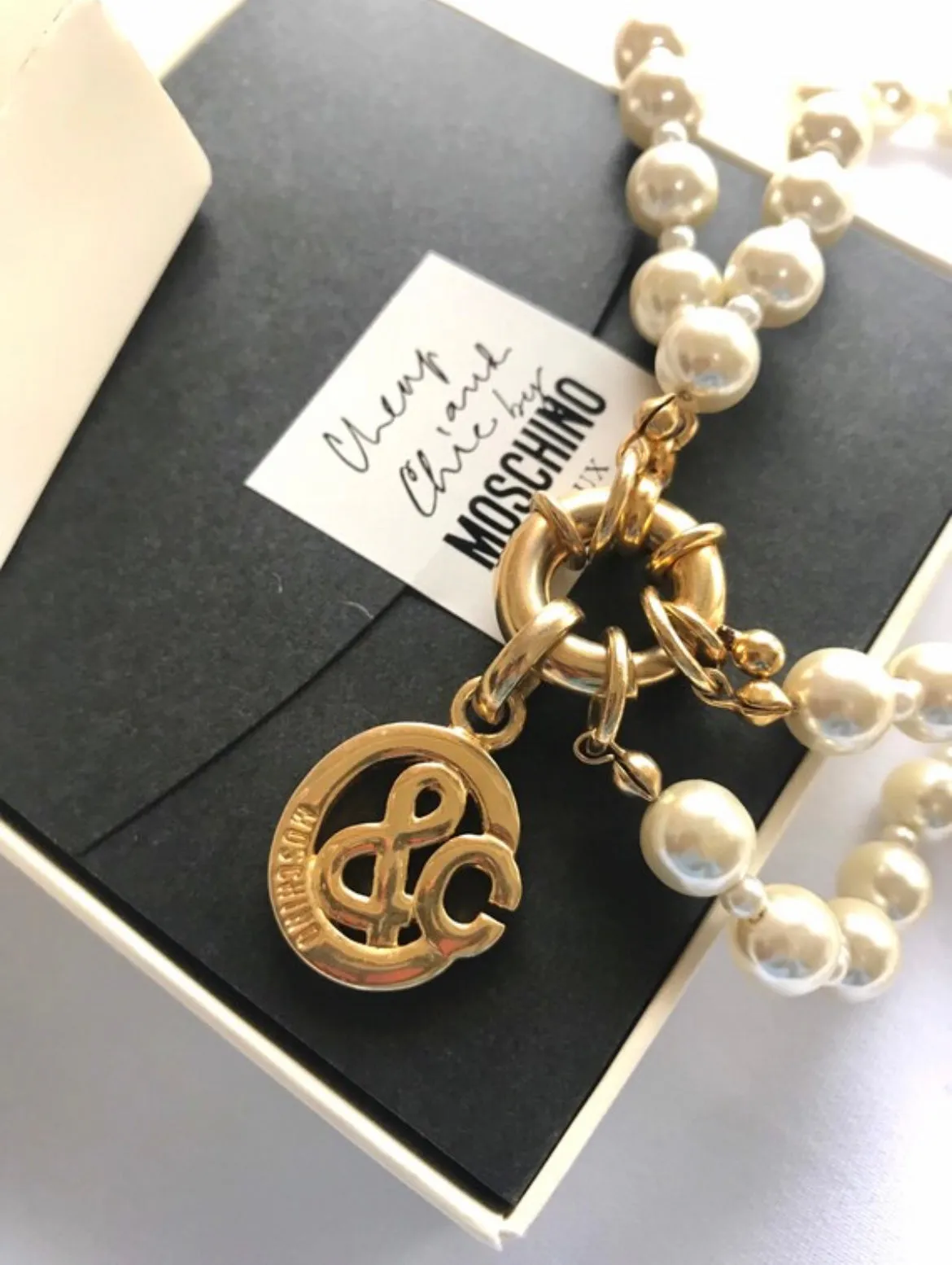 MINT. Vintage Moschino, Cheap and Chic Bijoux, double layer faux pearl necklace with golden logo charm. Rare and unique jewelry.0404042