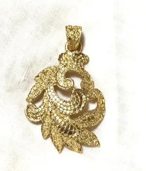 MINT. Vintage Yves Saint Laurent golden arabesque design pendant top. YSL leaf design top. Enjoy it with your own necklace. 061105re4