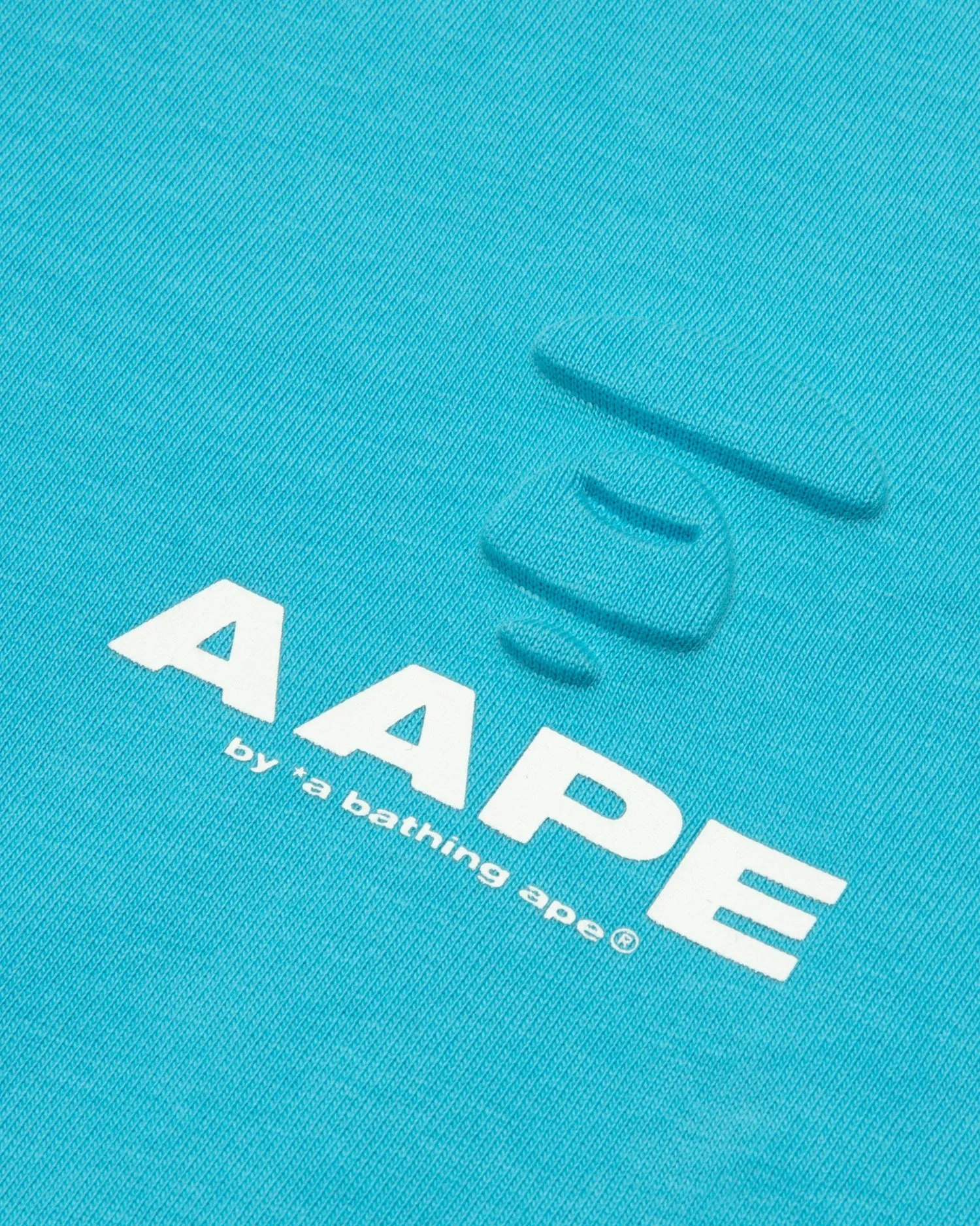 Moonface logo embossed tee