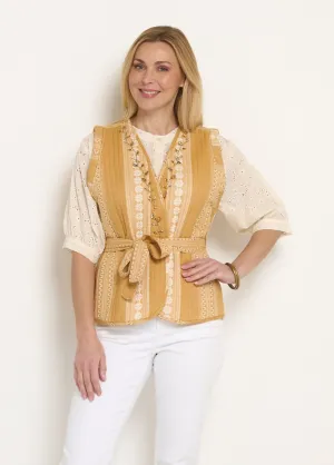 Sleeveless quilted jacket with rhinestone details