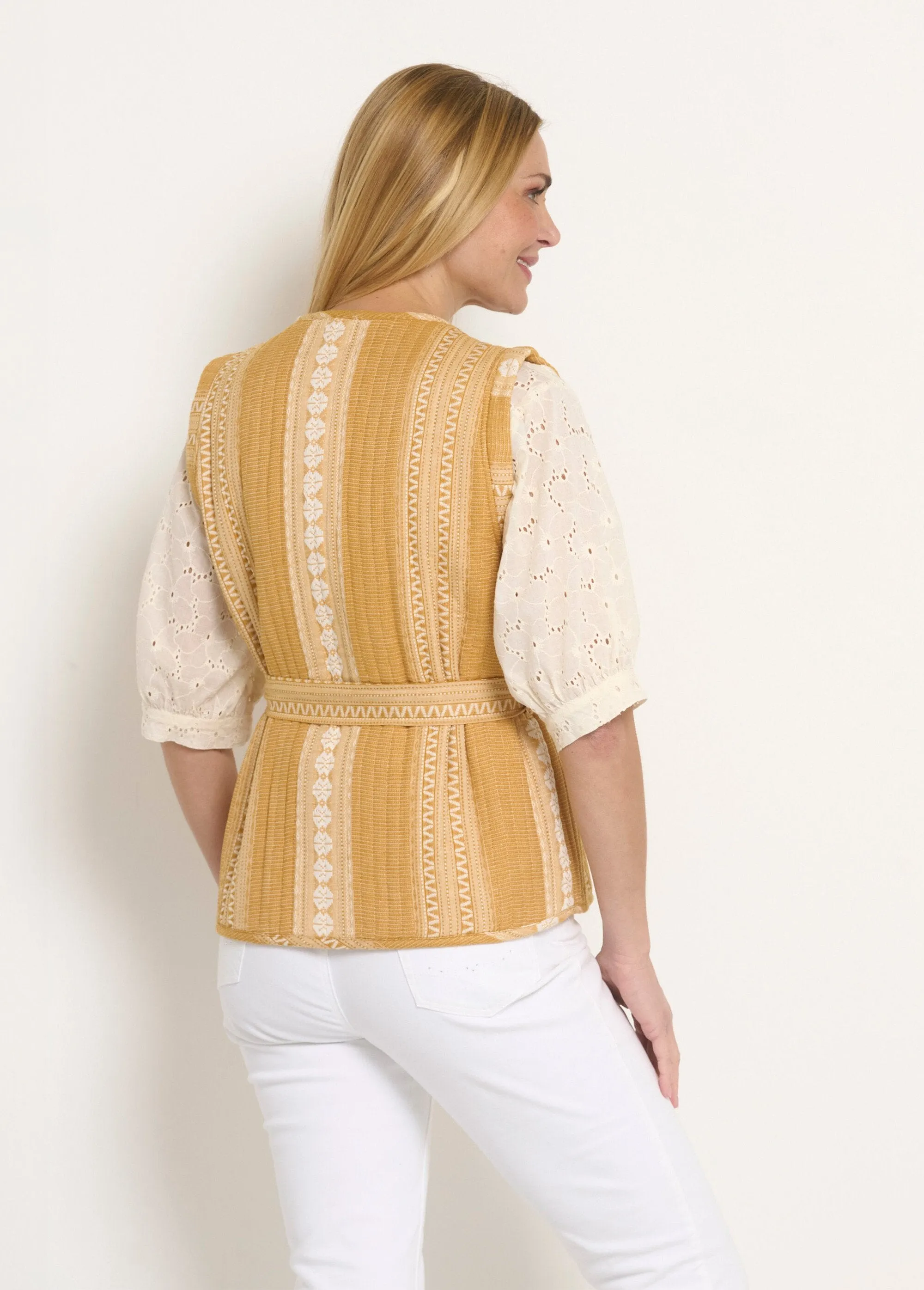 Sleeveless quilted jacket with rhinestone details