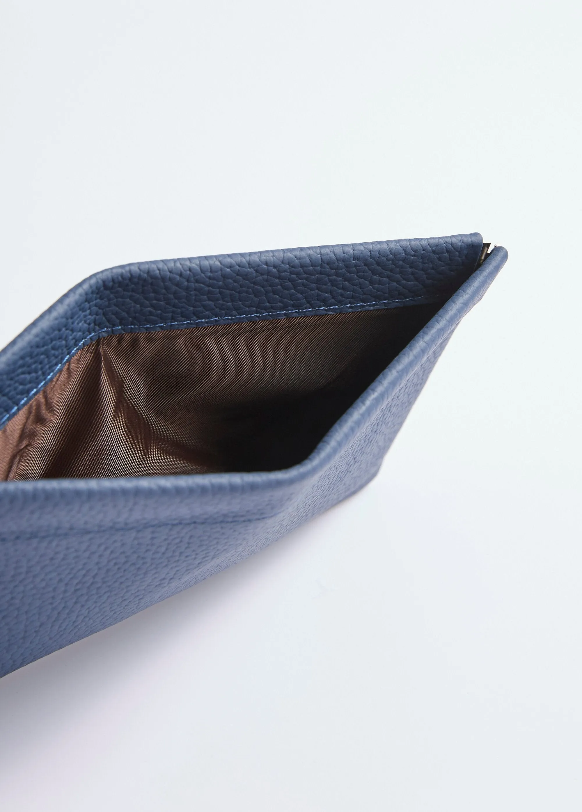 Small leather pouch with rigid closure